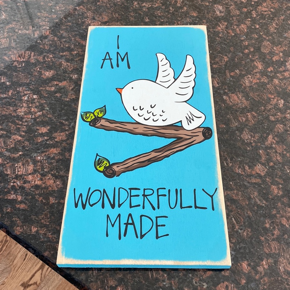 A wooden wall sign